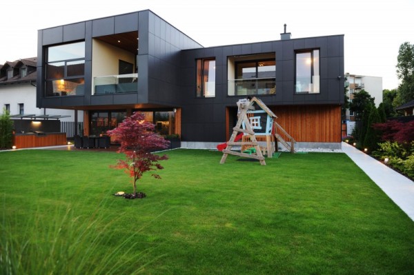 The-Black-Villa-view-with-small-red-tree